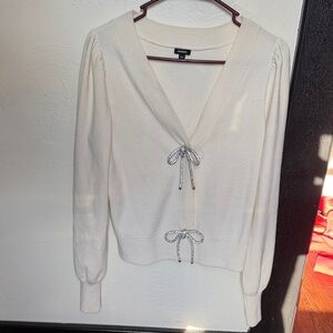 Express Cream Cardigan with Silver Bow Accents